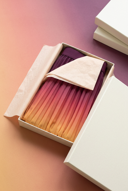 Folded ombre skirt in blank ivory box with peach tissue