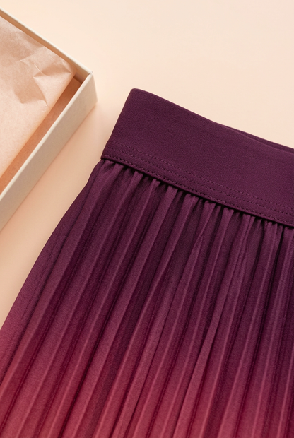 Deep plum waistband and upper pleat detail
