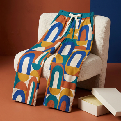 Geometric trousers styled over ivory chair